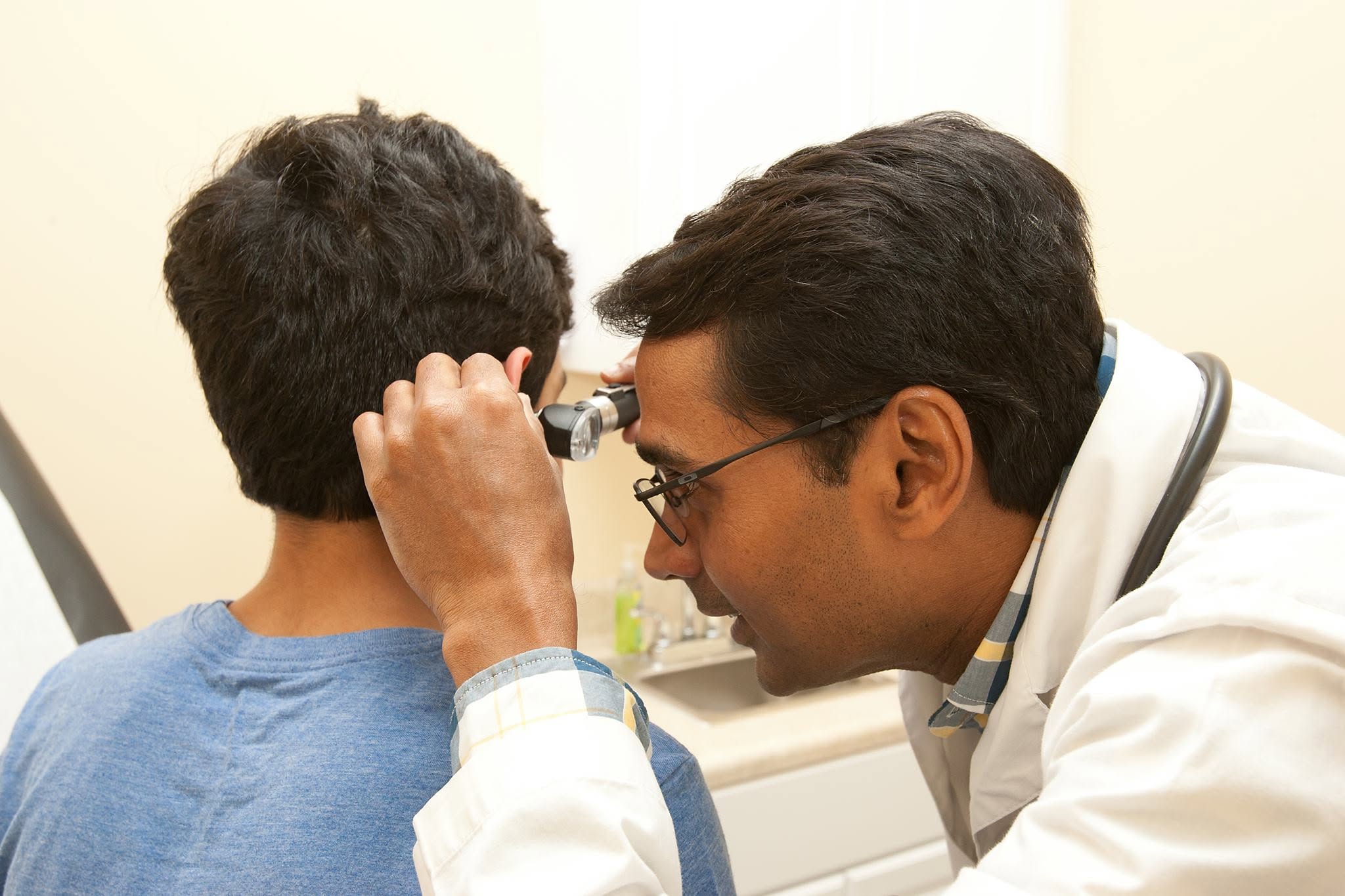 Doctor examining a patient