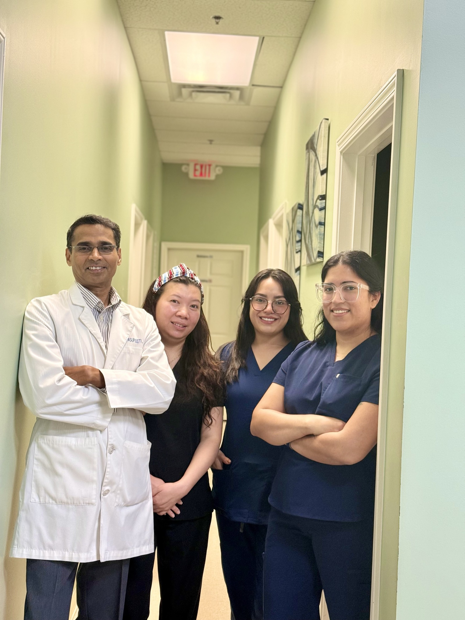 Trinity Family Clinic team in the exam room hallway